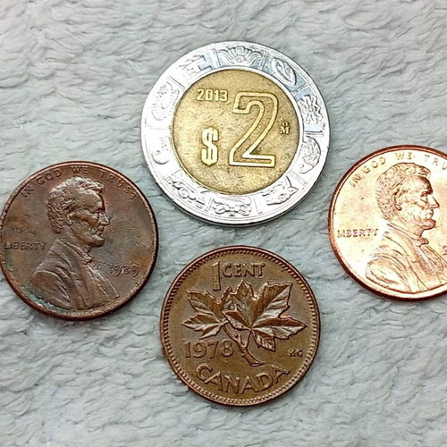 Mexican, Canadian & USA coins used, set of 4 M83-43