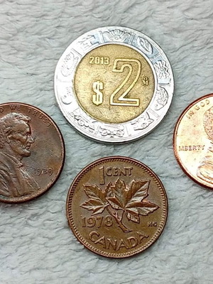 Mexican, Canadian & USA coins used, set of 4 M83-43
