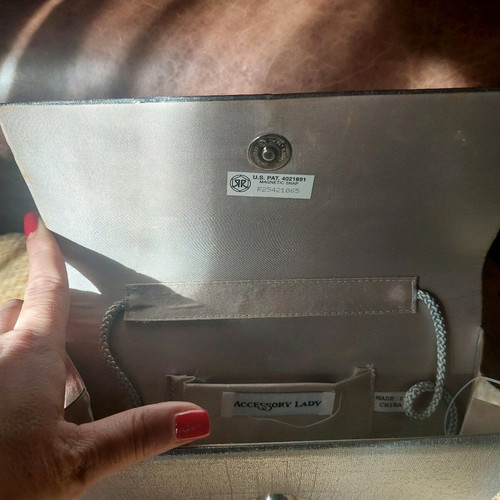 Vintage silver envelope hand bag like new with strap