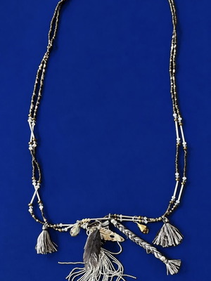 Long boho necklace with decorative beads and tassels like new