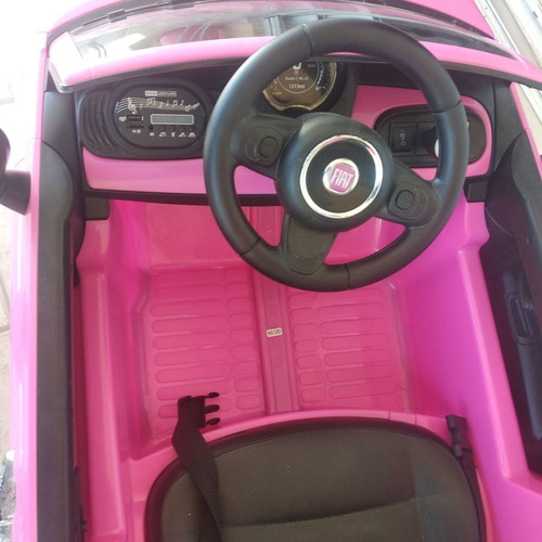 Children's Car Pink electric car with battery and charger. FIAT 500