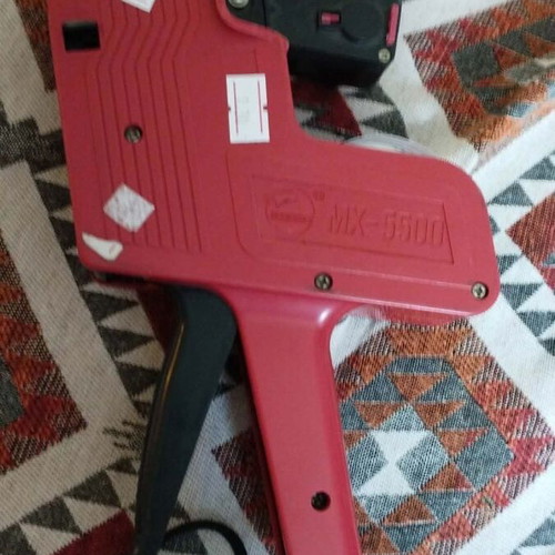 Motex MX-5500 handheld price labeler used with minor damage
