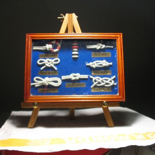 Picture frame with nautical knots used with stand