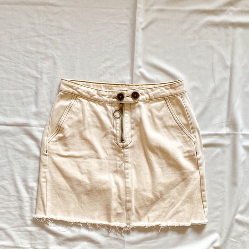 Pink Woman mini denim skirt with ripped hem like new, size 38