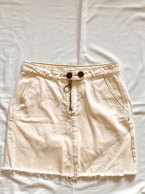 Pink Woman mini denim skirt with ripped hem like new, size 38