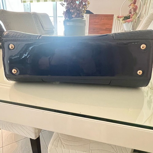 Navy Blue Lustre Handbag like new with gold metal details