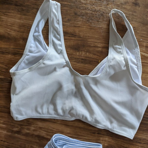 Bikini new, white top with gold heart details and baby blue bottom XS