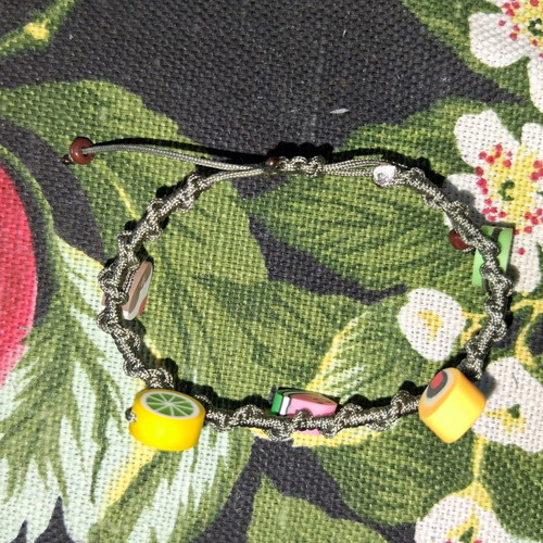 Macrame bracelet with decorative fruit beads