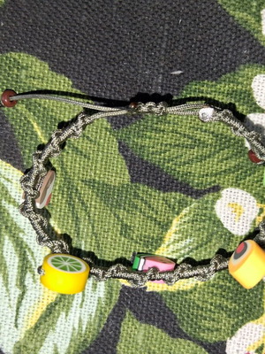 Macrame bracelet with decorative fruit beads