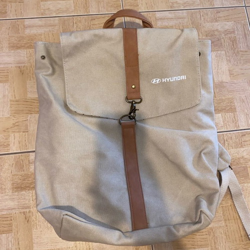 Backpack new, beige, large storage space, suitable for travel