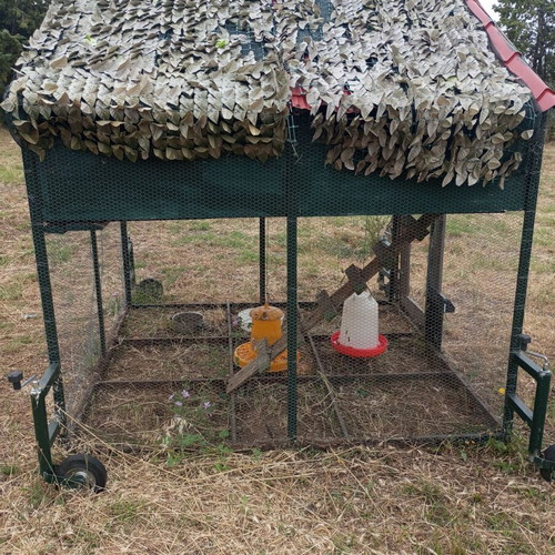 Mobile chicken coop used with automatic timer door