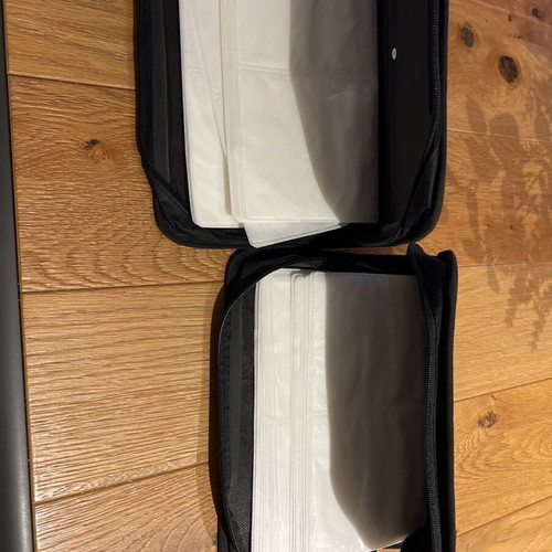CD cases like new with zipper, blue and red