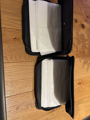 CD cases like new with zipper, blue and red