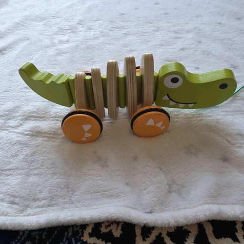 Hape pull along crocodile toy like new