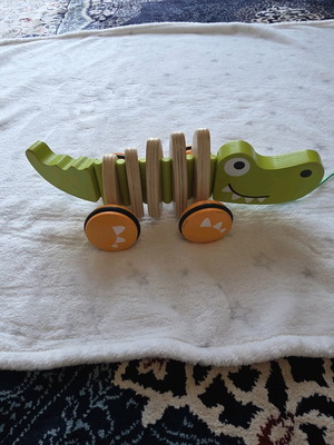 Hape pull along crocodile toy like new