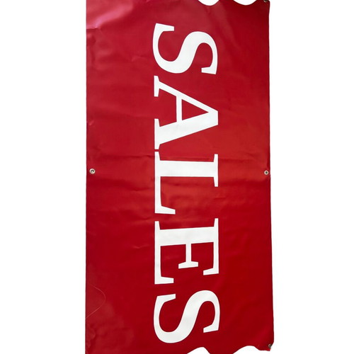 Sales Banner used, red with white letters, durable material