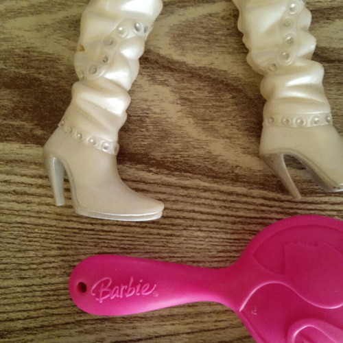 Barbie boots and combs used
