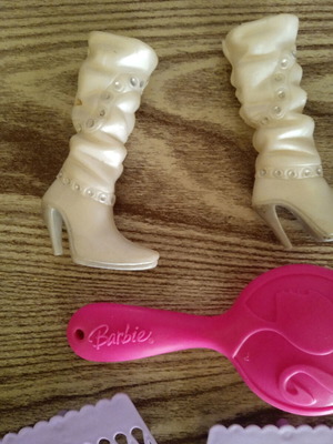 Barbie boots and combs used
