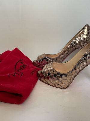 Christian Louboutin Metallic Heels size 38 used, bronze color
