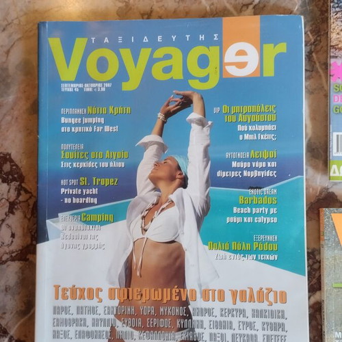 Voyager magazines and travel guides used, pack of five magazines and four guides