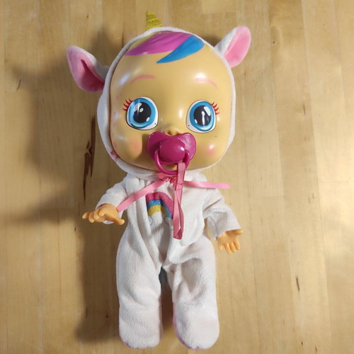 Big Klklapsoulini Unicorn Doll like new, cries with real tears