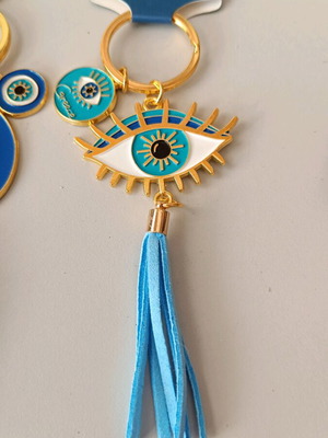 Aegeanart keychain new, gold with turquoise eye and tassel