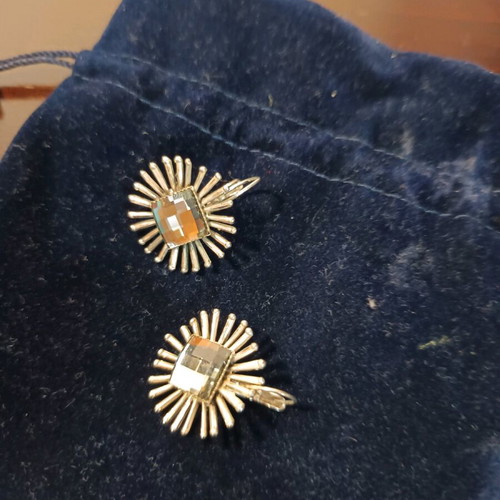 Earrings used, silver color