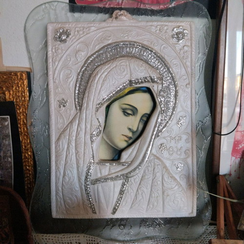 Virgin Mary image used with glass background and embossed design