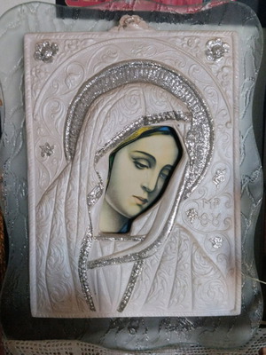 Virgin Mary image used with glass background and embossed design