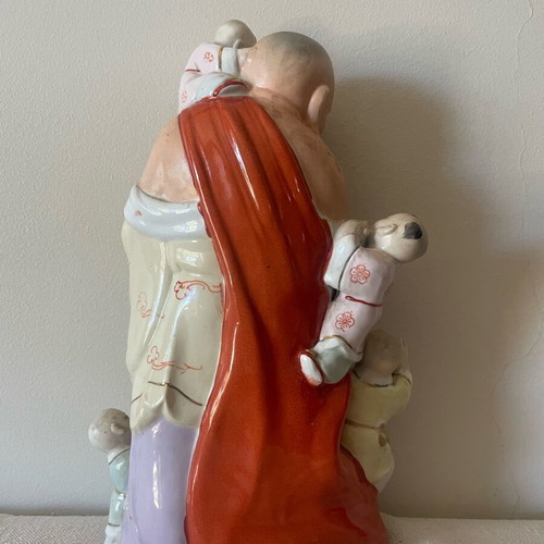 Buddha statue with children used, porcelain 35cm