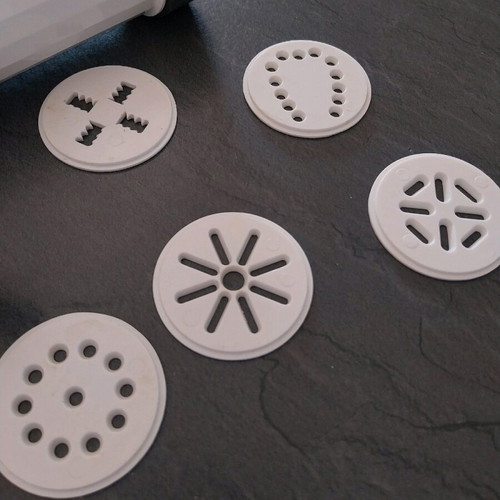 Cookie press used with 5 design discs