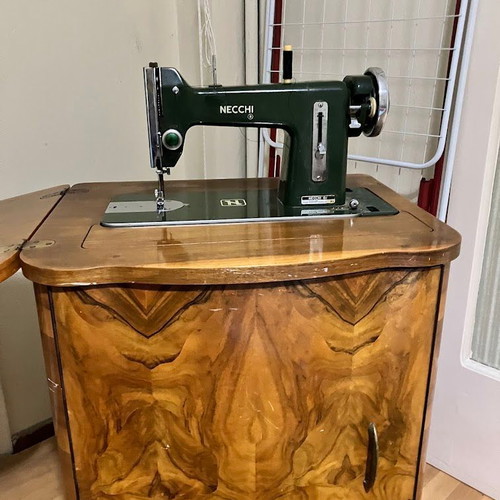 Necchi sewing machine used with antique cabinet, fully functional