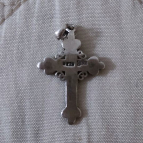 Silver cross like new, missing one small stone