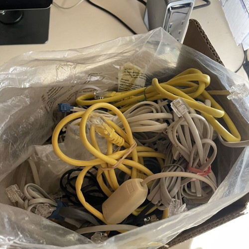 Router and 1kg bag of internet cables used