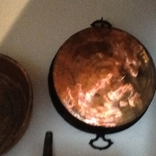 Copper cooking utensils used, large pan and deep platter