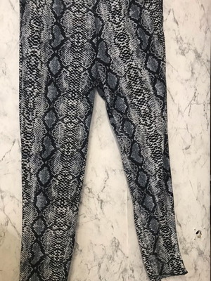 Black and white pants with snake pattern used