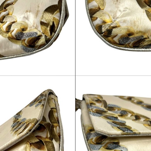 Roberto Cavalli silk clutch used with signs of wear and discoloration