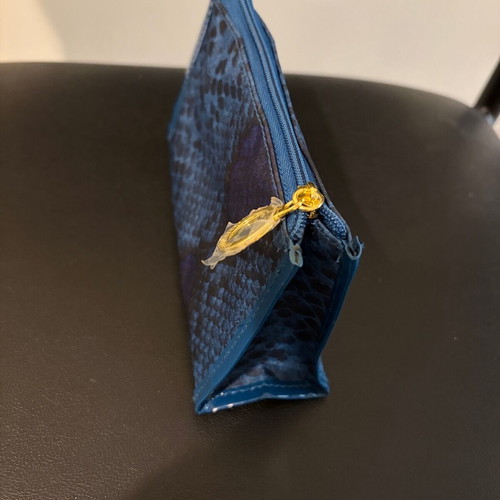 Estée Lauder toiletry bag like new with blue and gold snake skin pattern