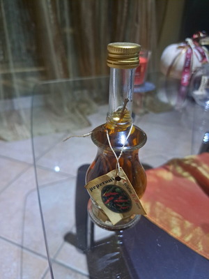 Italian liqueur Cristian di Marko with chili pepper cluster new