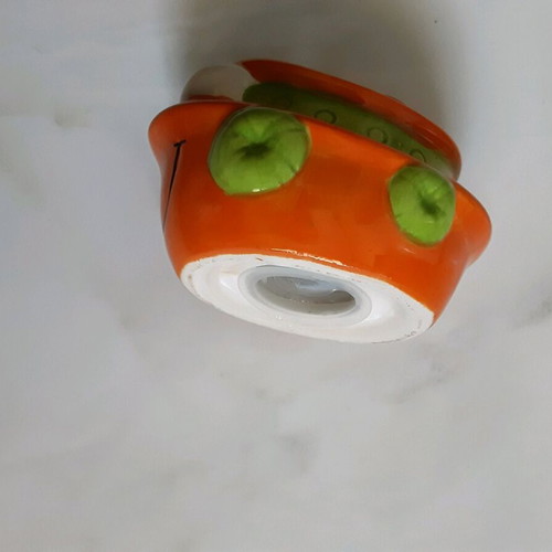 Small boat-shaped piggy bank like new