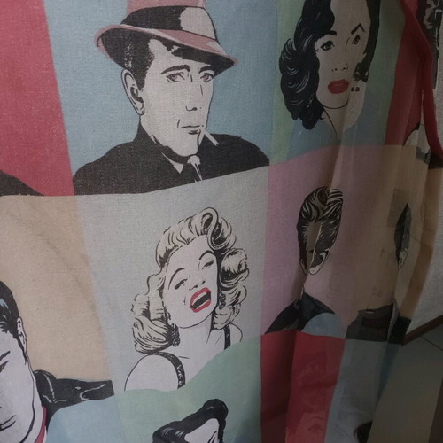 Pop art patterned curtain and orange wooden frame