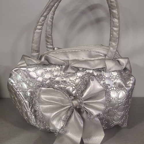 Silver handheld evening bag new, height 23 cm
