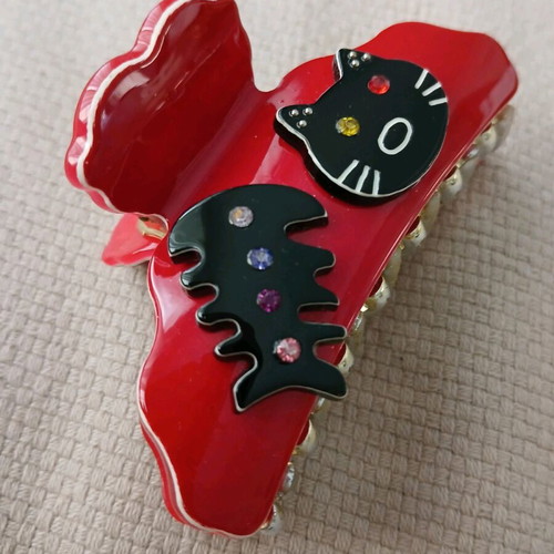 Artstar hair clip red with cat design like new