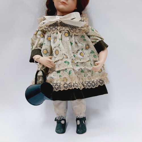 Vintage gardener doll with original outfit and watering can