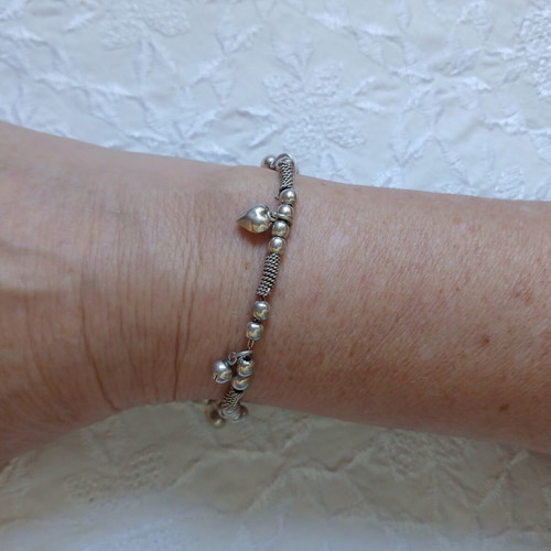 Silver 925 bracelet with hanging hearts and beads, like new