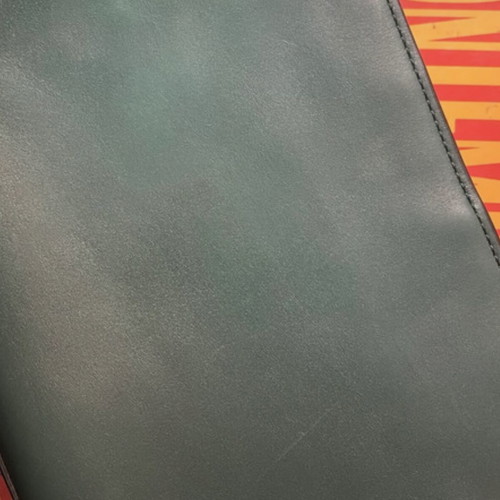 Karl Lagerfeld green quilted leather clutch bag used