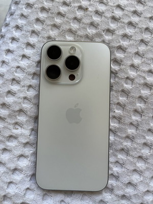 iPhone 15 Pro 128GB White Titanium used, battery 88%