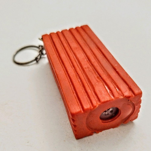 Happy Brick keychain like new, soft and lightweight