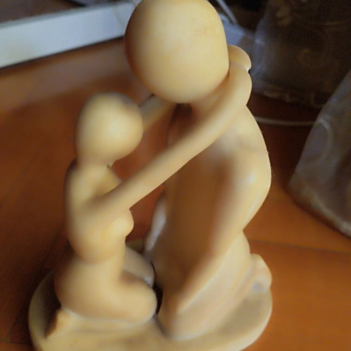 Figurine used, woman detached but held on man's neck, 21 cm