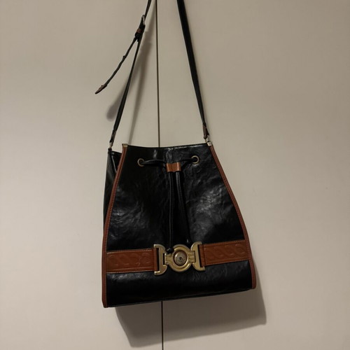 Bartuggi vintage leather shoulder bag black with brown details and gold buckle like new